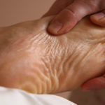 Therapist performing Foot Reflexology Massage