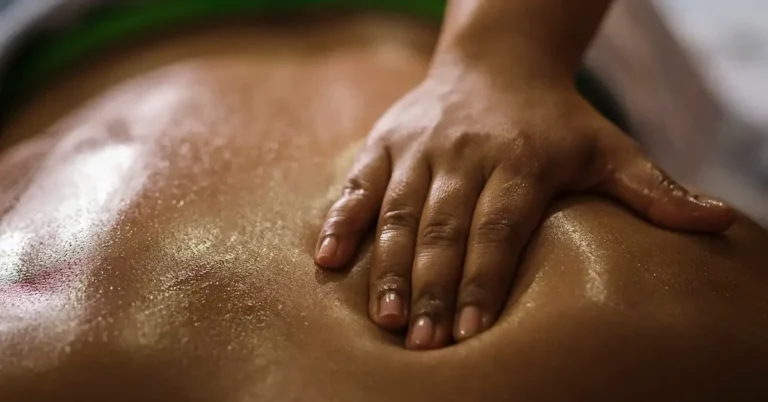 Therapist performing deep tissue massage at Reno Massage Tree to relieve muscle tension and improve circulation