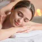 Woman relaxing during a lymphatic drainage massage at Reno Massage Tree.