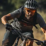 Mountain biker on a Lake Tahoe trail recovering with sports massage therapy from Reno Massage Tree to relieve tension and improve performance