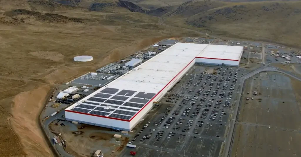 Massage and recovery in Reno NV with an aerial view of the Tesla Gigafactory representing the city’s modern growth