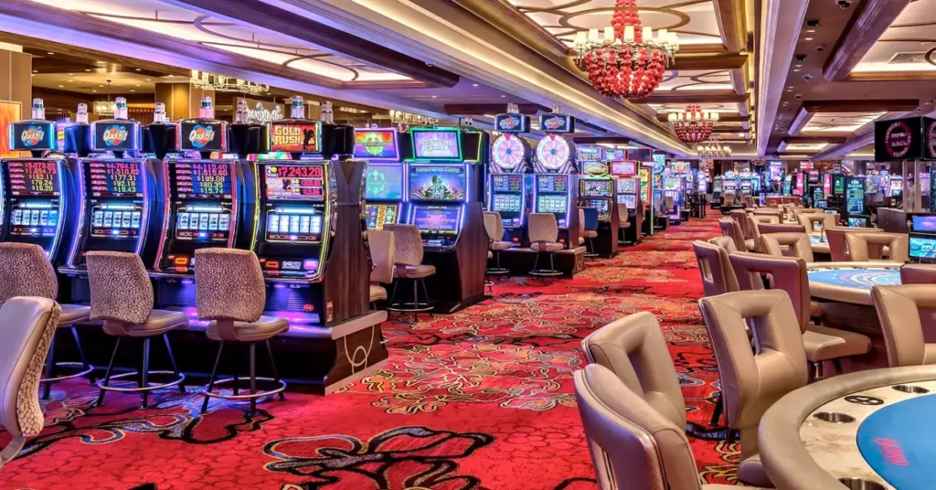 Massage and relaxation in Reno NV, bright casino floor with slot machines and colorful lights