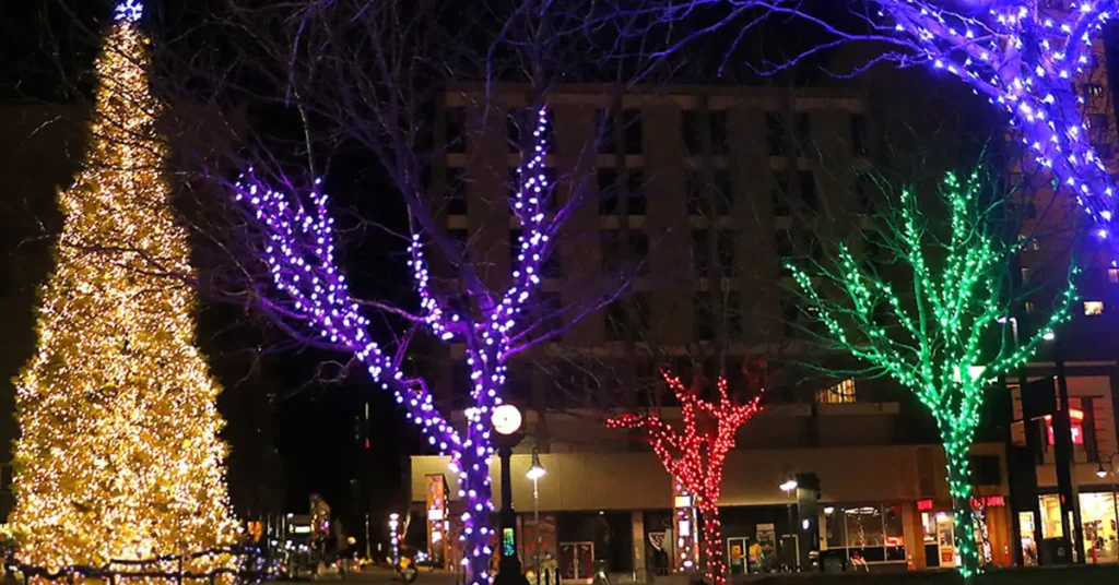 Massage and relaxation in Reno NV with colorful holiday lights and a decorated Christmas tree downtown during winter