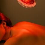 female receives infrared therapy