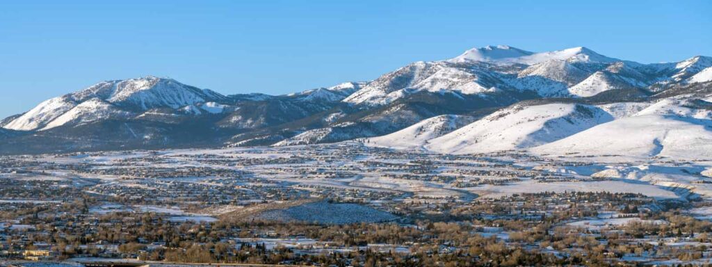 View of Truckee Meadows and snow-covered Mount Rose ski area near Reno, Nevada