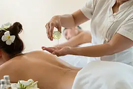 Therapist applying deep tissue massage for muscle tension relief at Reno Massage Tree in Reno, Nevada